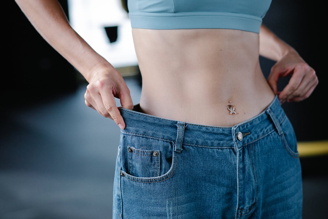 The Rising Trend of Gold Belly Rings: Why You Need a 14K Gold Belly Piercing