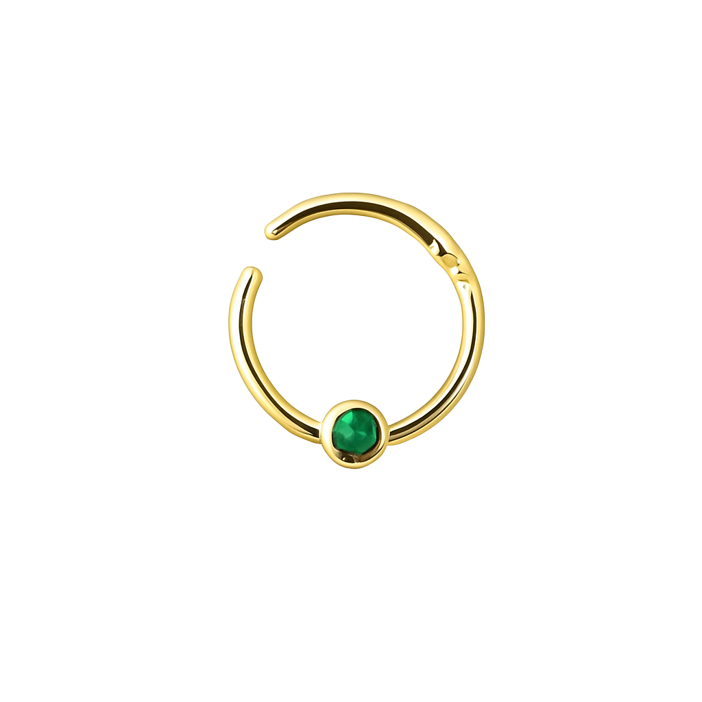 Front view of 14K gold septum ring clicker with Green Eemerald bezel, daith piercing jewelry