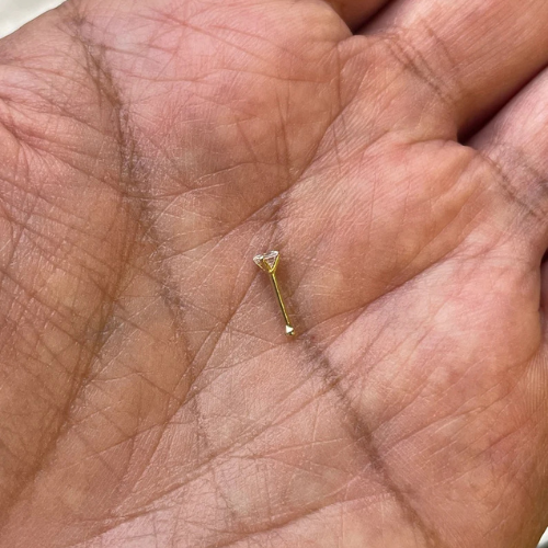 Luxury 14K solid yellow gold nose stud with natural diamond in jewelry packaging